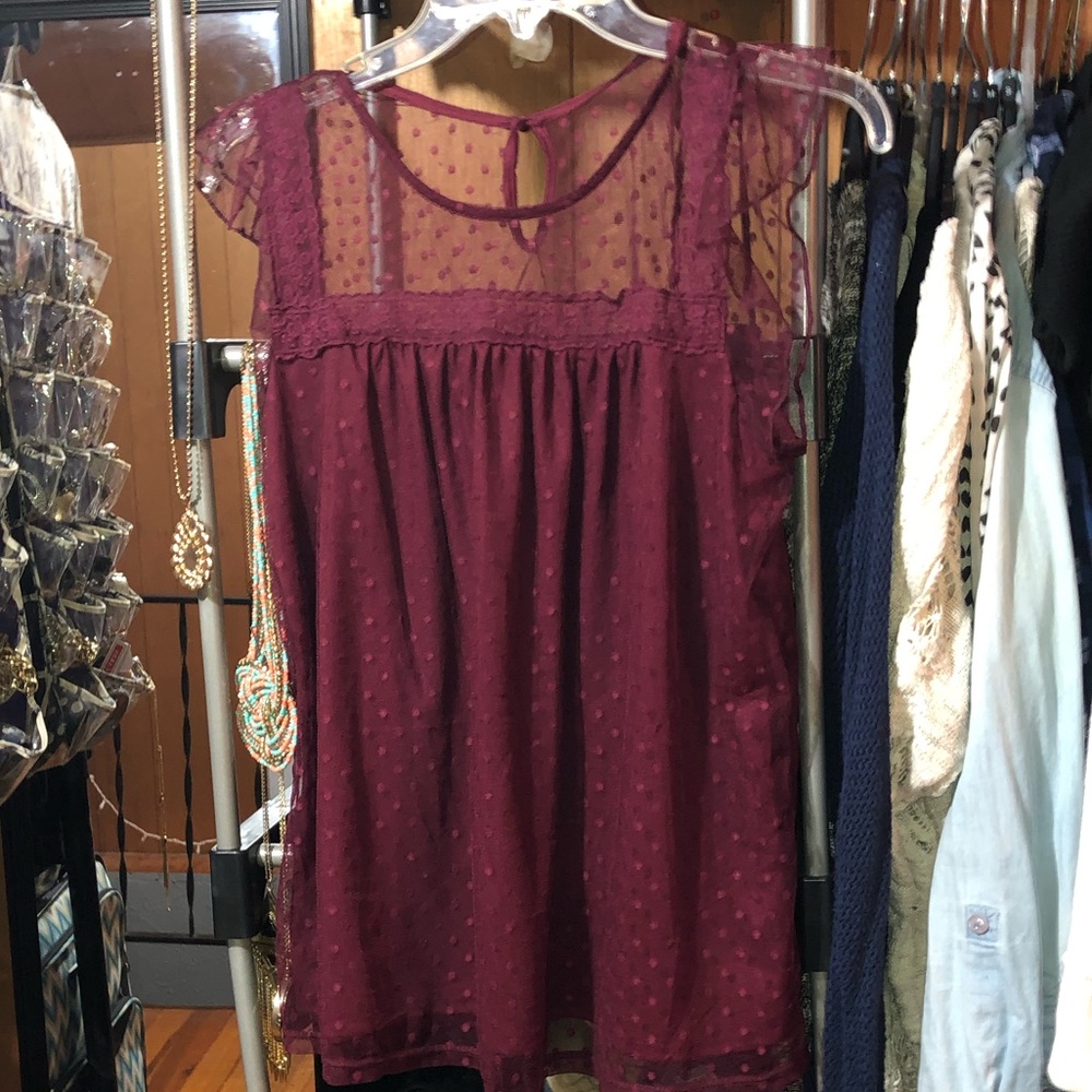 Sleeveless burgundy blouse